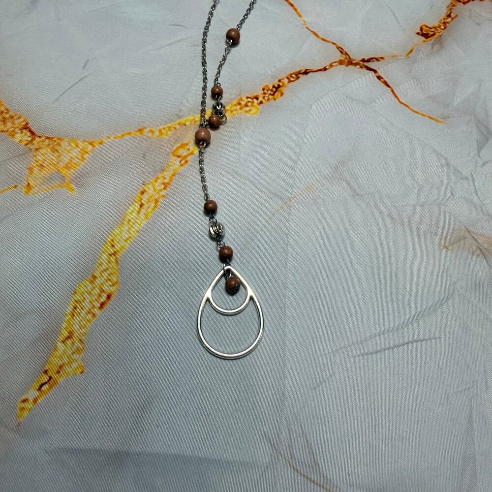 Silver teardrop pendant necklace with wooden beads